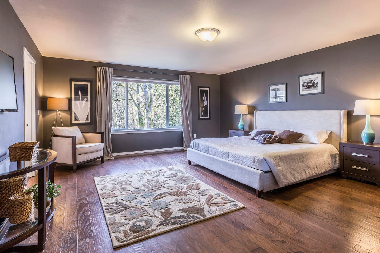 Carpeted bedroom with sitting area