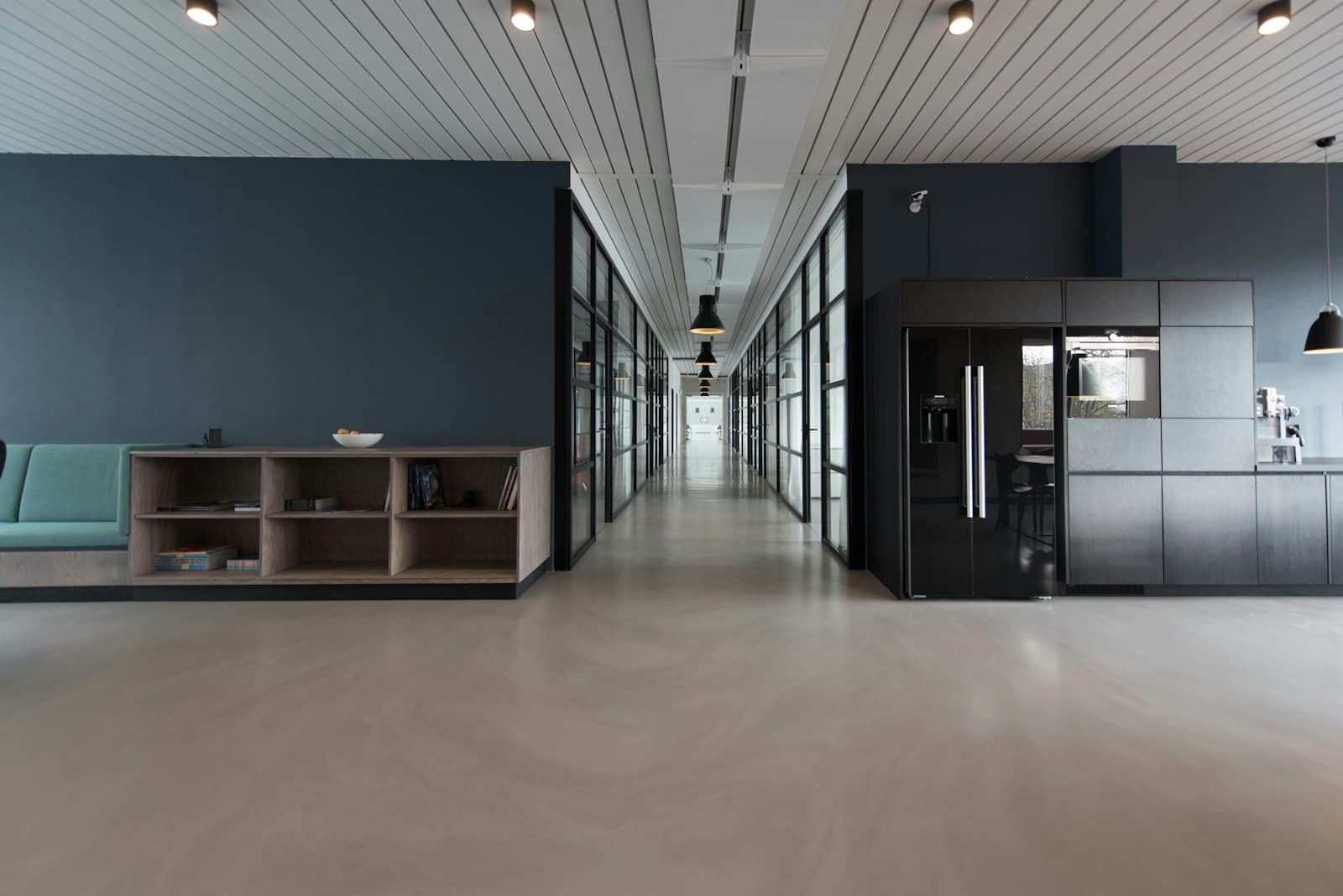 Office corridor with glass partitions